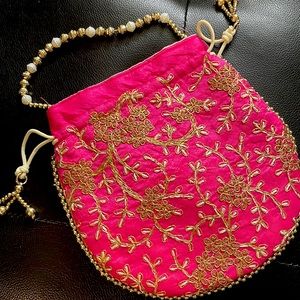 Indian Potli Bag With Intricate Gold Embroidery